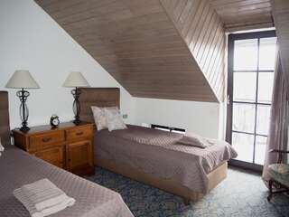 Отели типа «постель и завтрак» Rusne Villa Русне Двухместный номер с 2 отдельными кроватями и балконом-1
